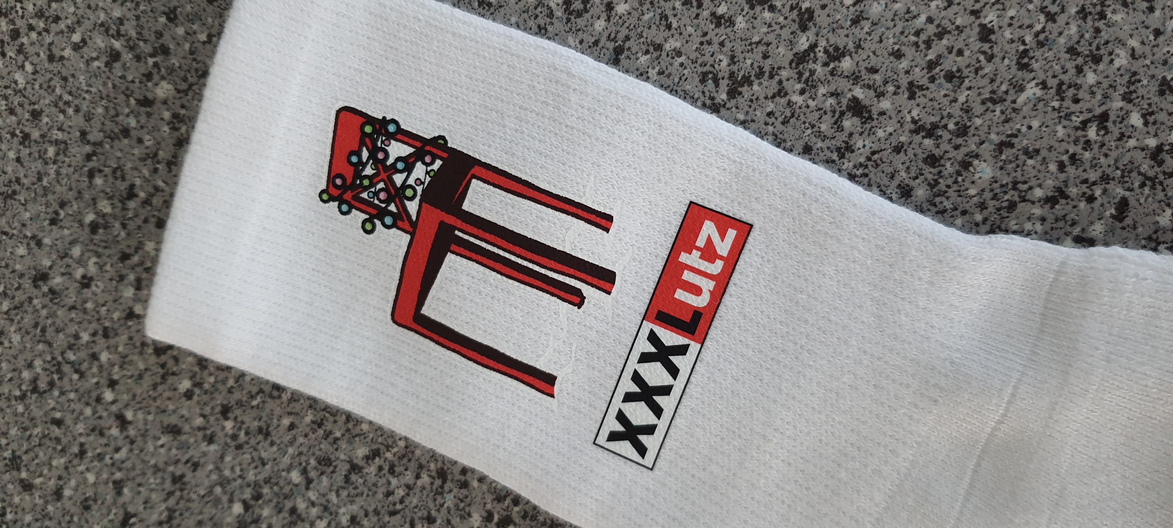 Socken-Druckerei - max. 5 x 7 cm, mehrfarbig (pro Seite) Socken-Druckerei - max. 5 x 7 cm, mehrfarbig (pro Seite)